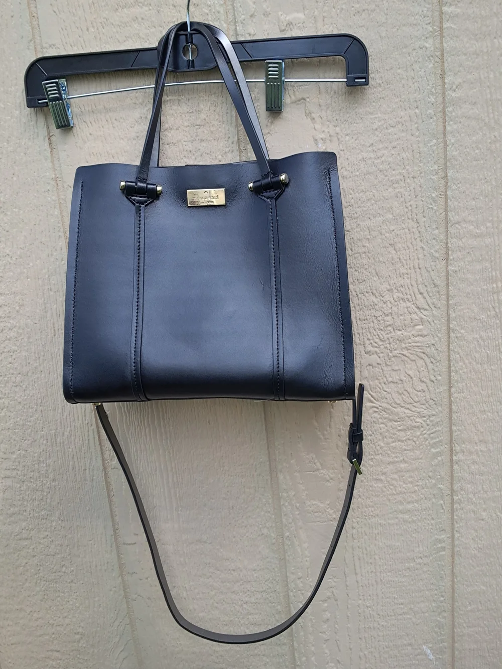Kate Spade New York black leather tote bag with shoulder strap​